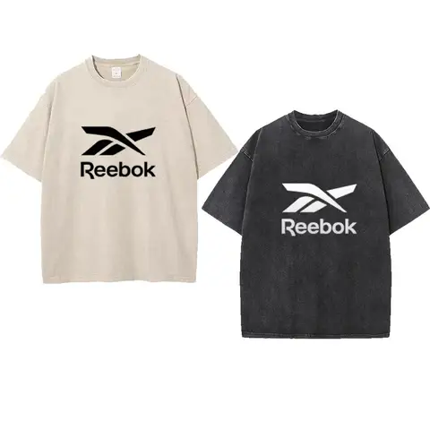 تي شيرت Reebok رياضي للجنسين برقبة دائرية